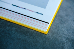 Hardcover-based binding options for printing a book are best for open-flat readability