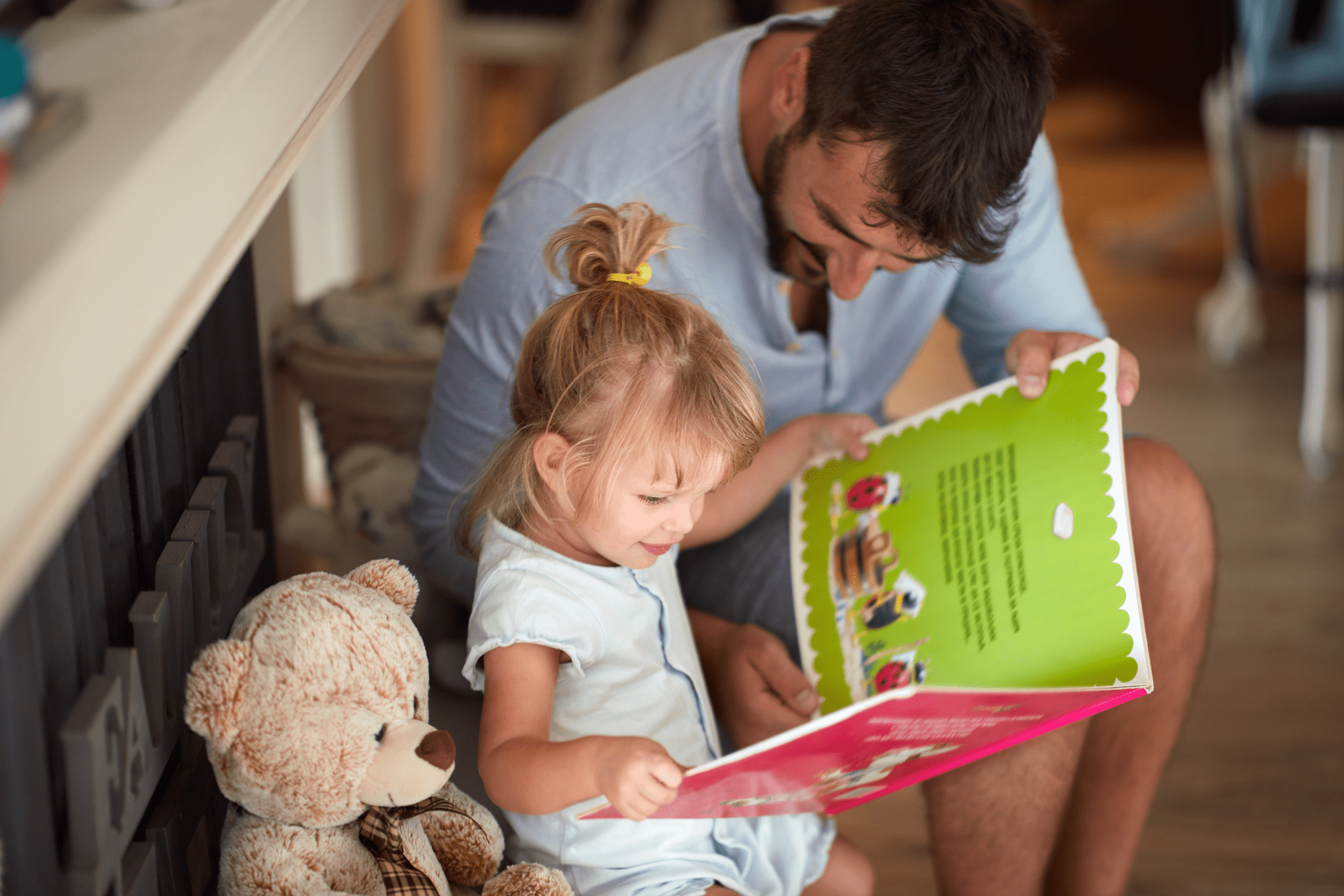 Father and daughter are reading a personalised kids' book printed and delivered across South Africa.